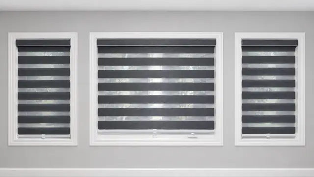 Charcoal zebra blinds on three side-by-side windows
